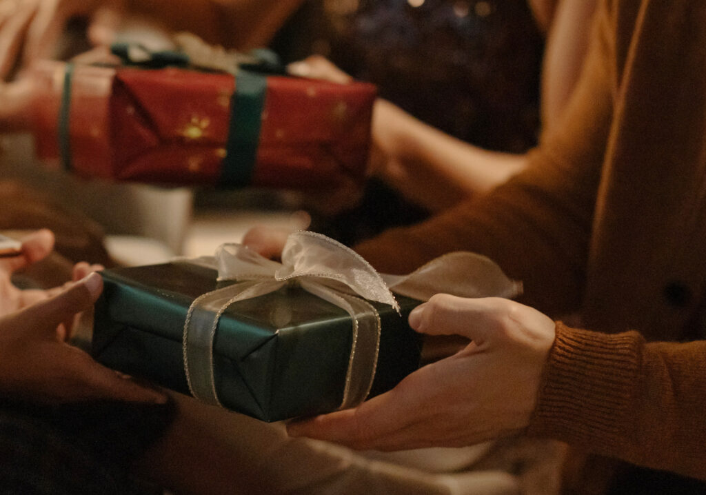 hands of a person accepting a gift