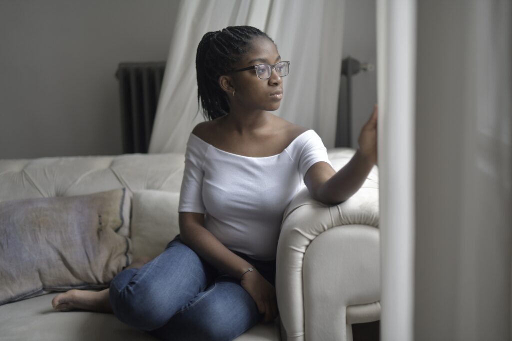 Woman looking out a window