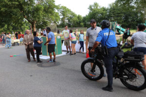 Community members gather along the closed roadway for the June 15 Pottstown Play Streets event.